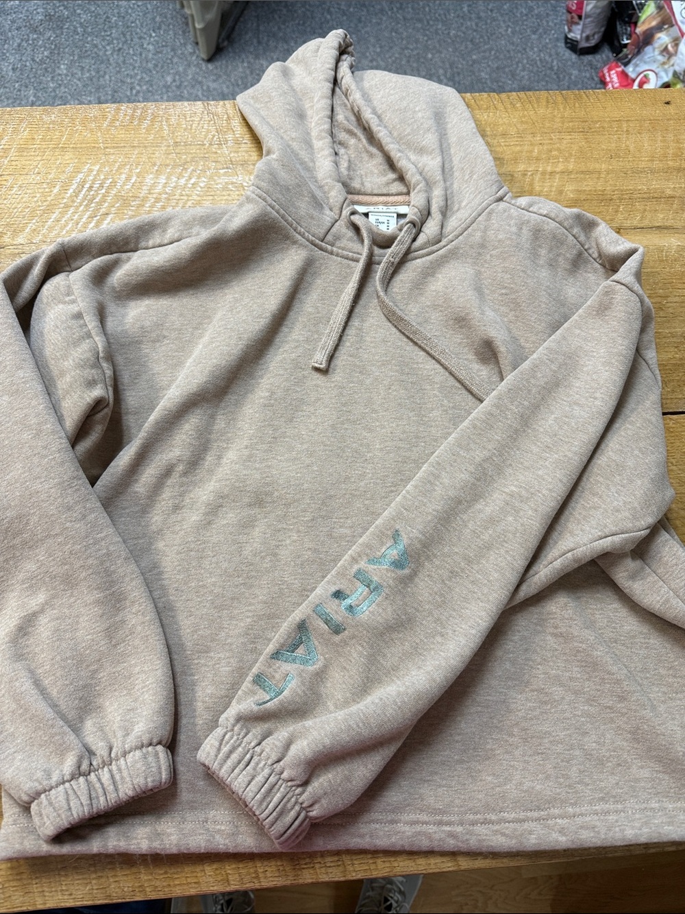 Ariat waiste length hoodie with draw string waiste